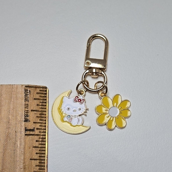 Hello Kitty Keychain Sitting on Crescent Moon - Picture 2 of 6